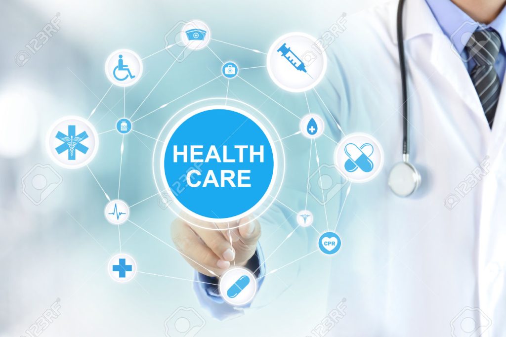 Doctor hand touching HEALTH CARE sign on virtual screen